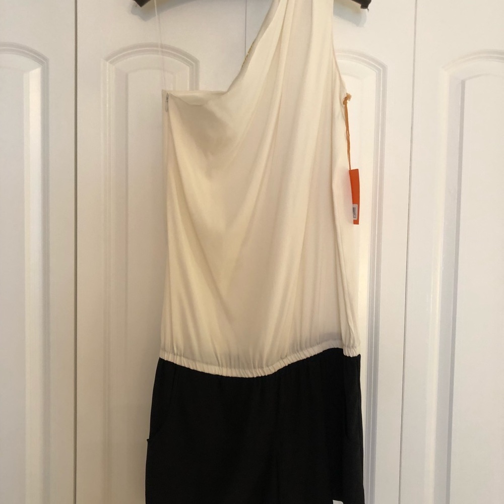 Romper. Black and white silk. Adorable!  New!